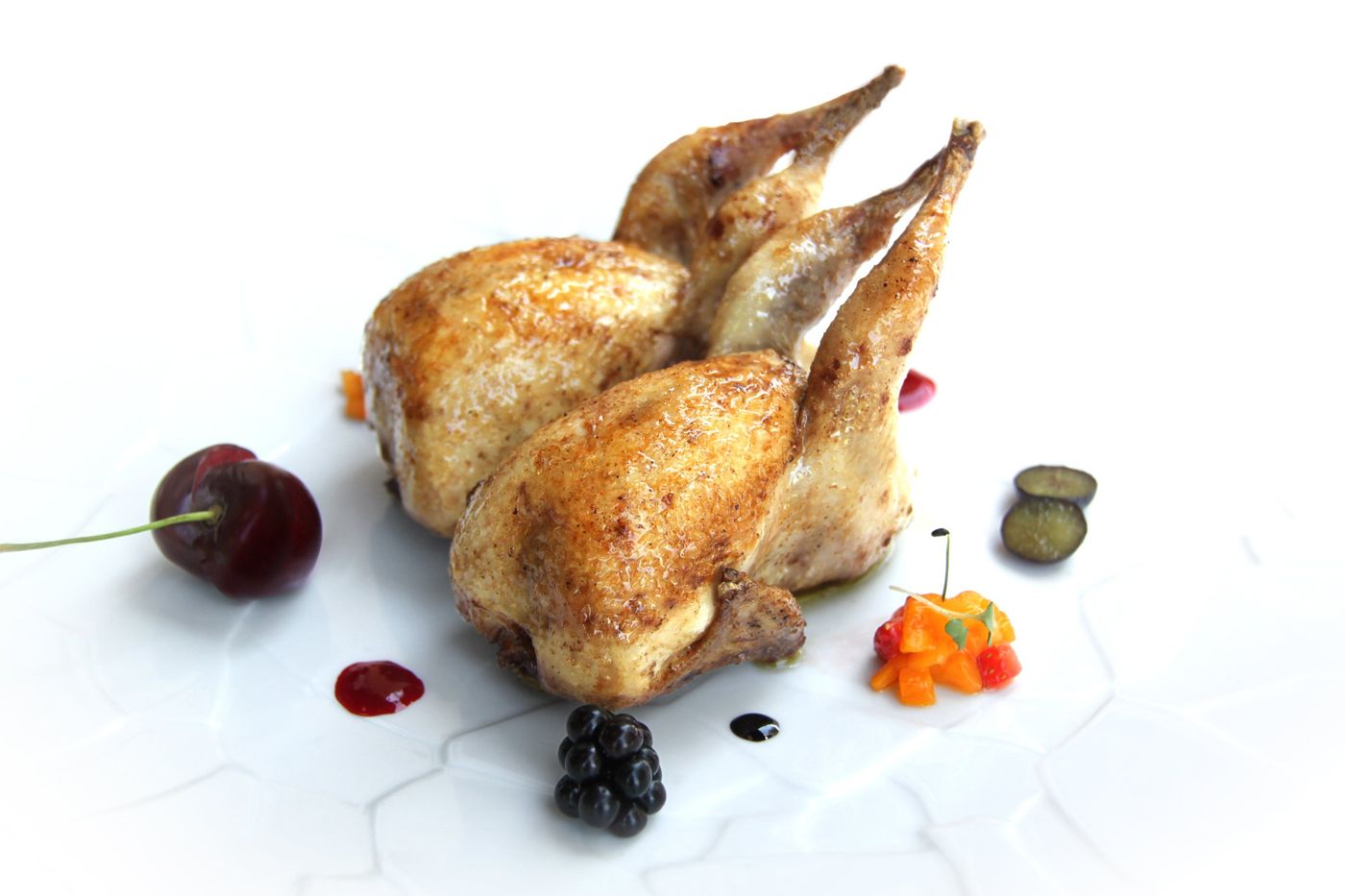 Roasted whole quail with fresh berries